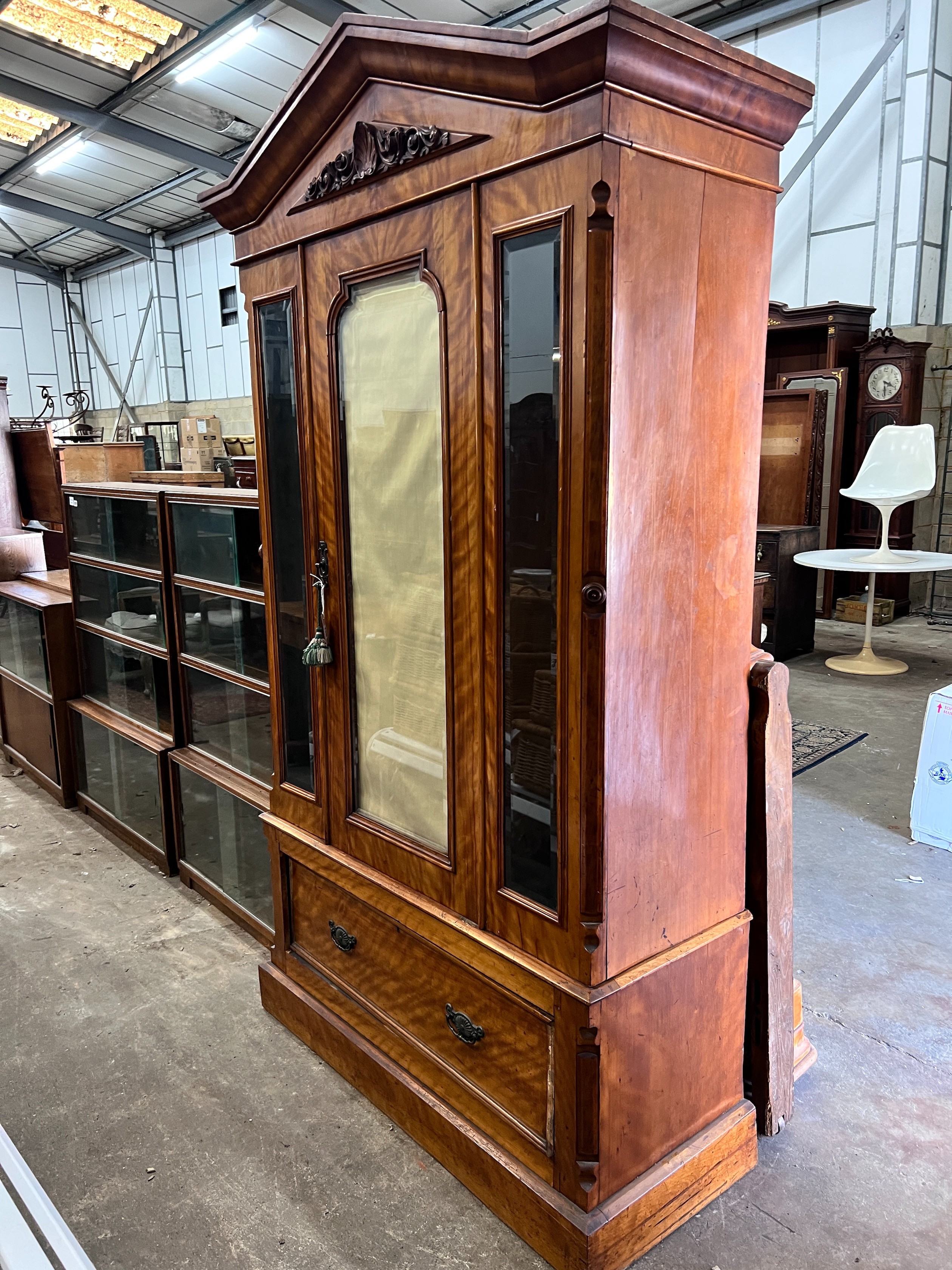 A Victorian satin birch wardrobe with bevelled glass front, length 124cm, depth 51cm, height 222cm *Please note the sale commences at 9am.